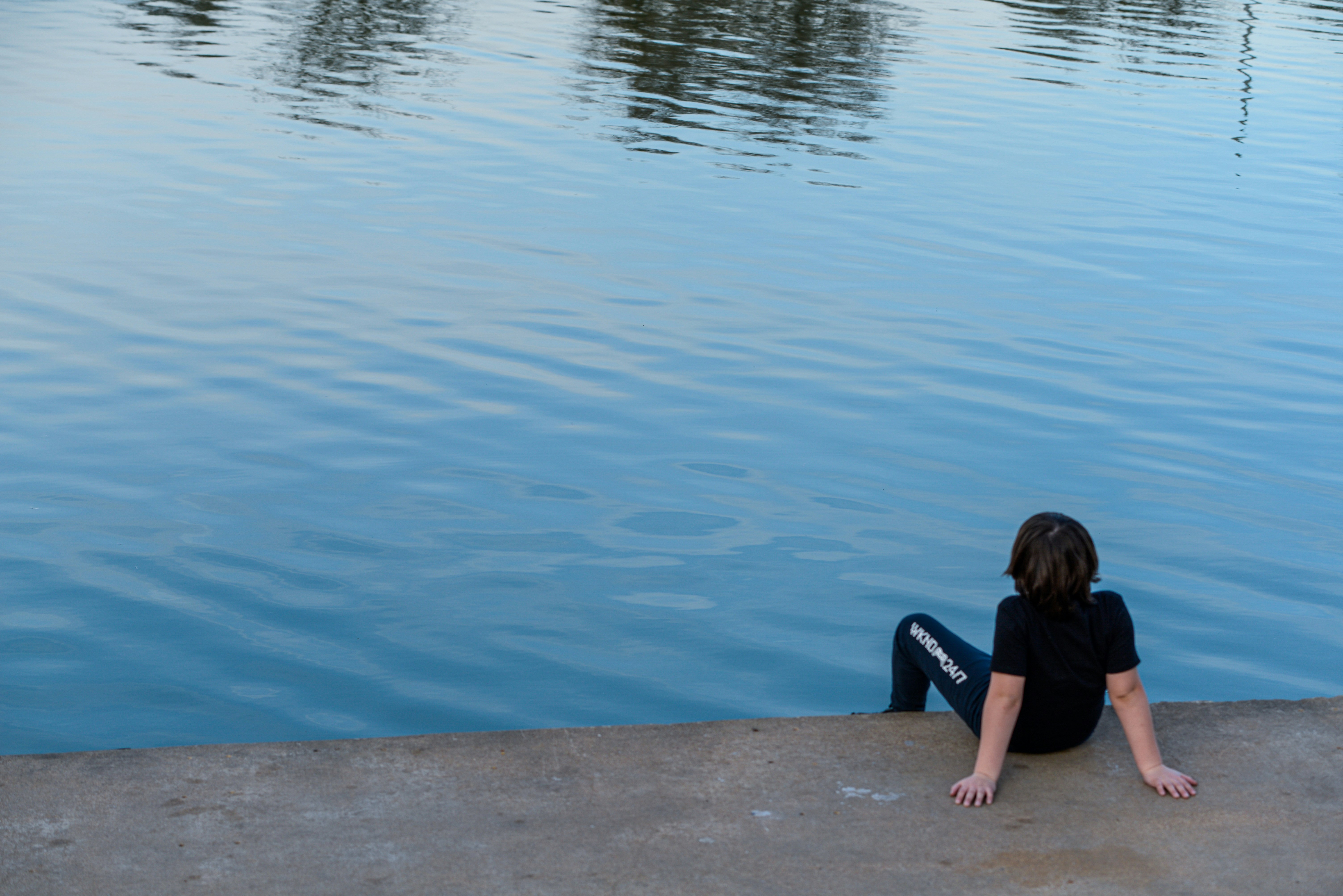 Child practicing mindfulness outdoors